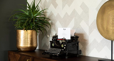 typewriter on a cupboard